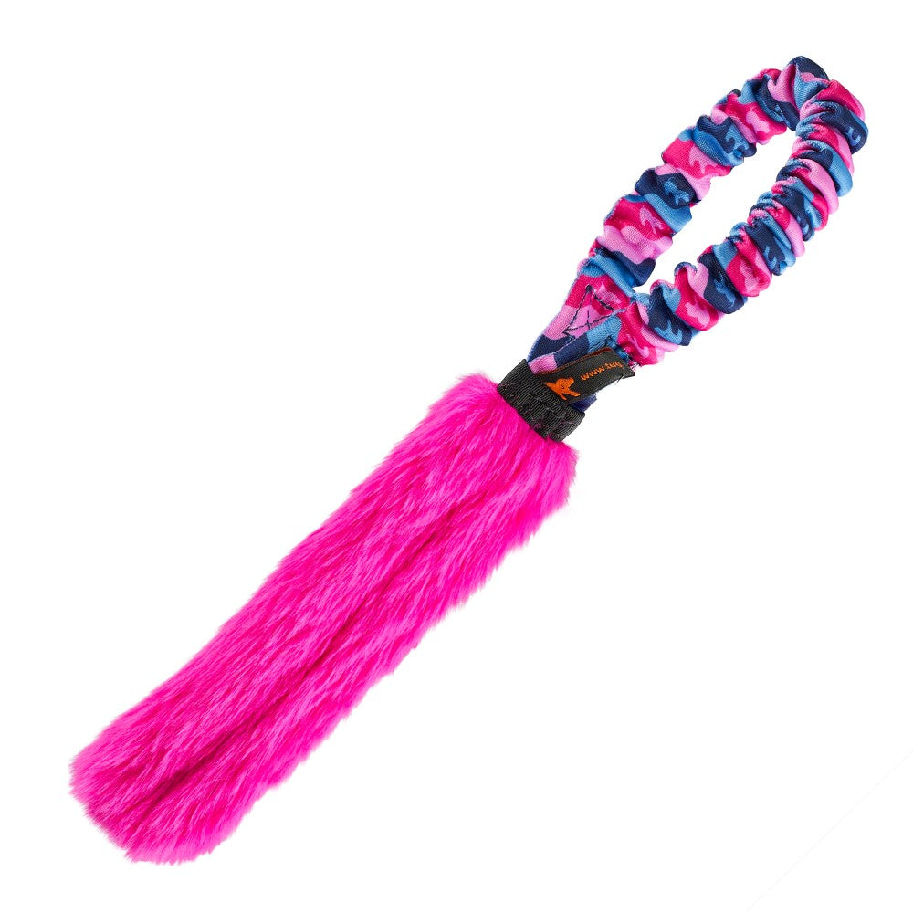 A compact pocket sized tug toy for interactive dog training, with pink patterned bungee handle and pink faux fur.